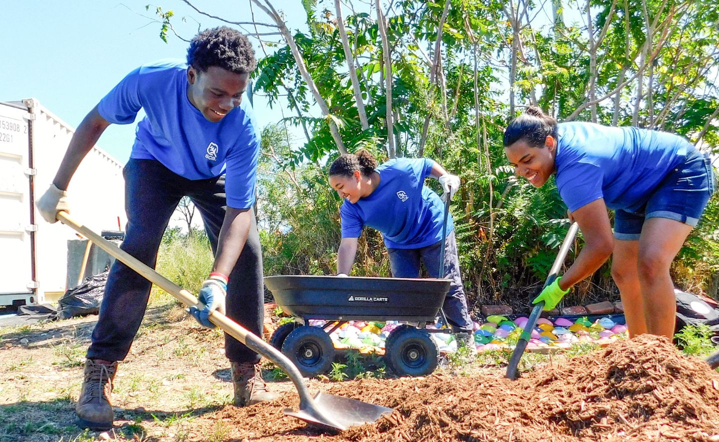 Urban Green New York City members planting a tree