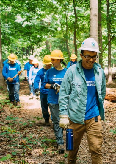 SCA Field Leader leading crew through forest